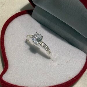 Sterling Silver Round-Cut Solitaire Ring with Pavé Band - White
